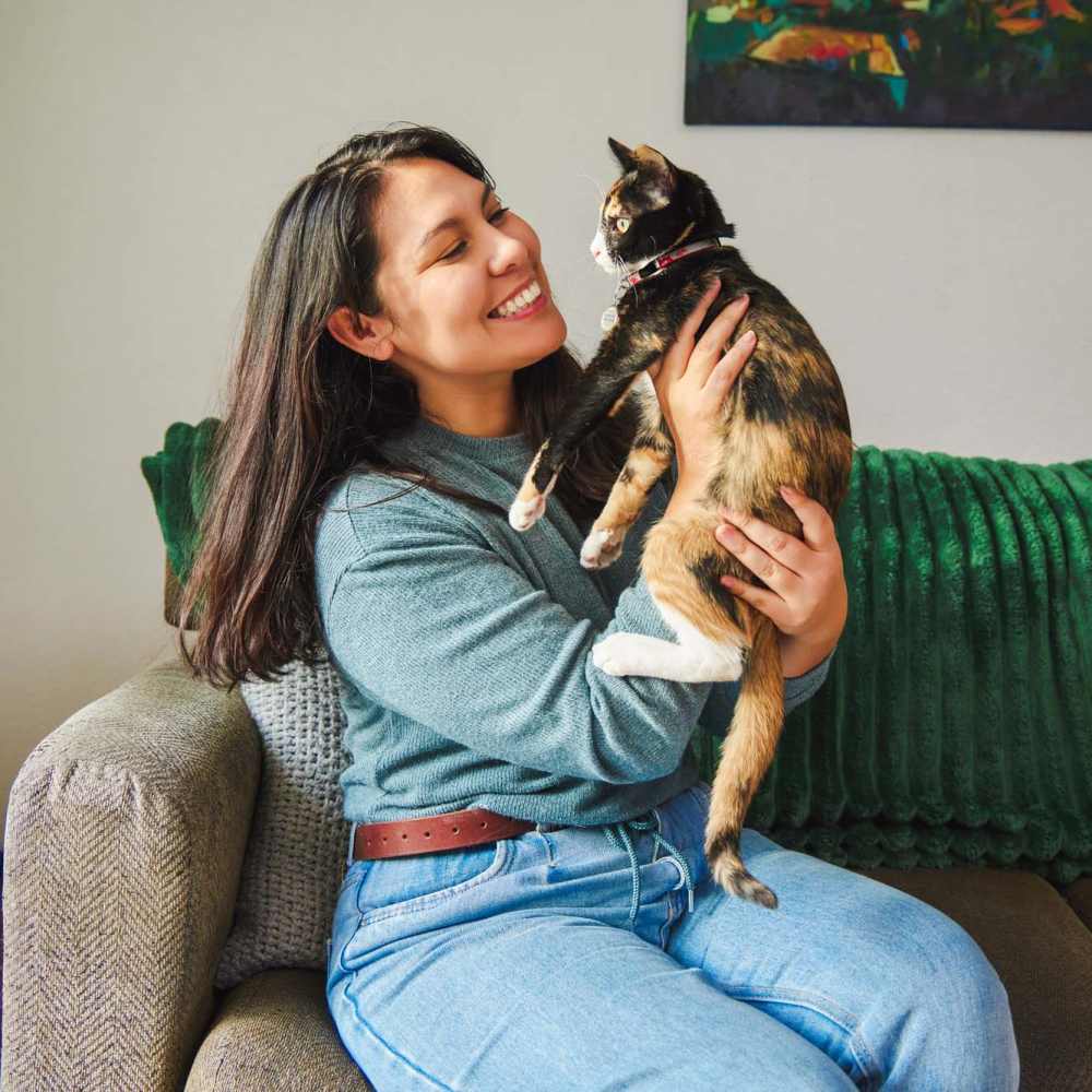 A woman holding her pet cat at Marlowe Place in Charlotte,North Carolina