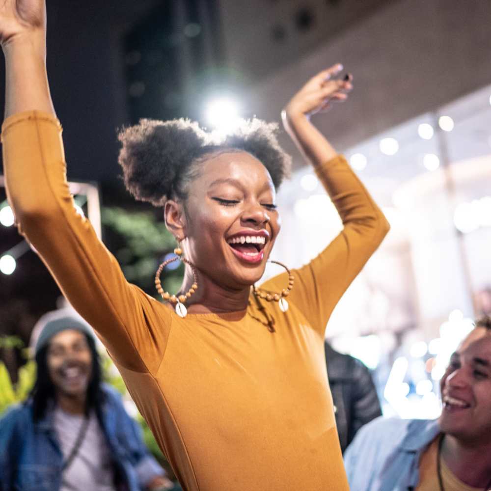 A student dancing with joy at The Edge in Pensacola,Florida