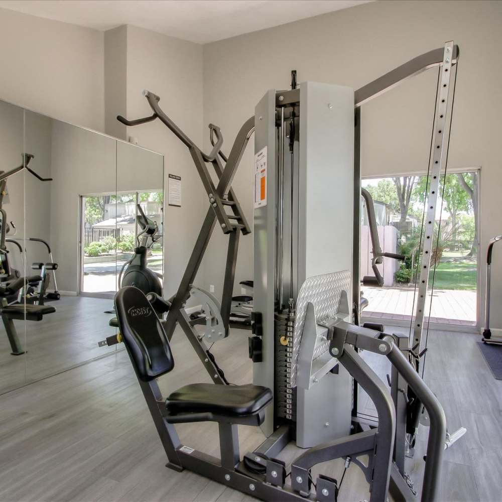 Well-equipped fitness center at Village Green Apartments in San Jose, California