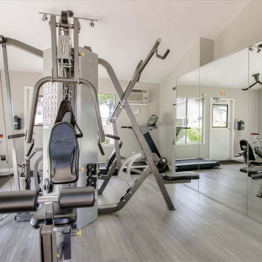Various equipment in the gym at Village Green Apartments in San Jose, California