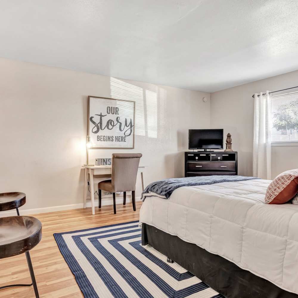 Light-filled bedroom at The Grand 1501 in College Station, Texas