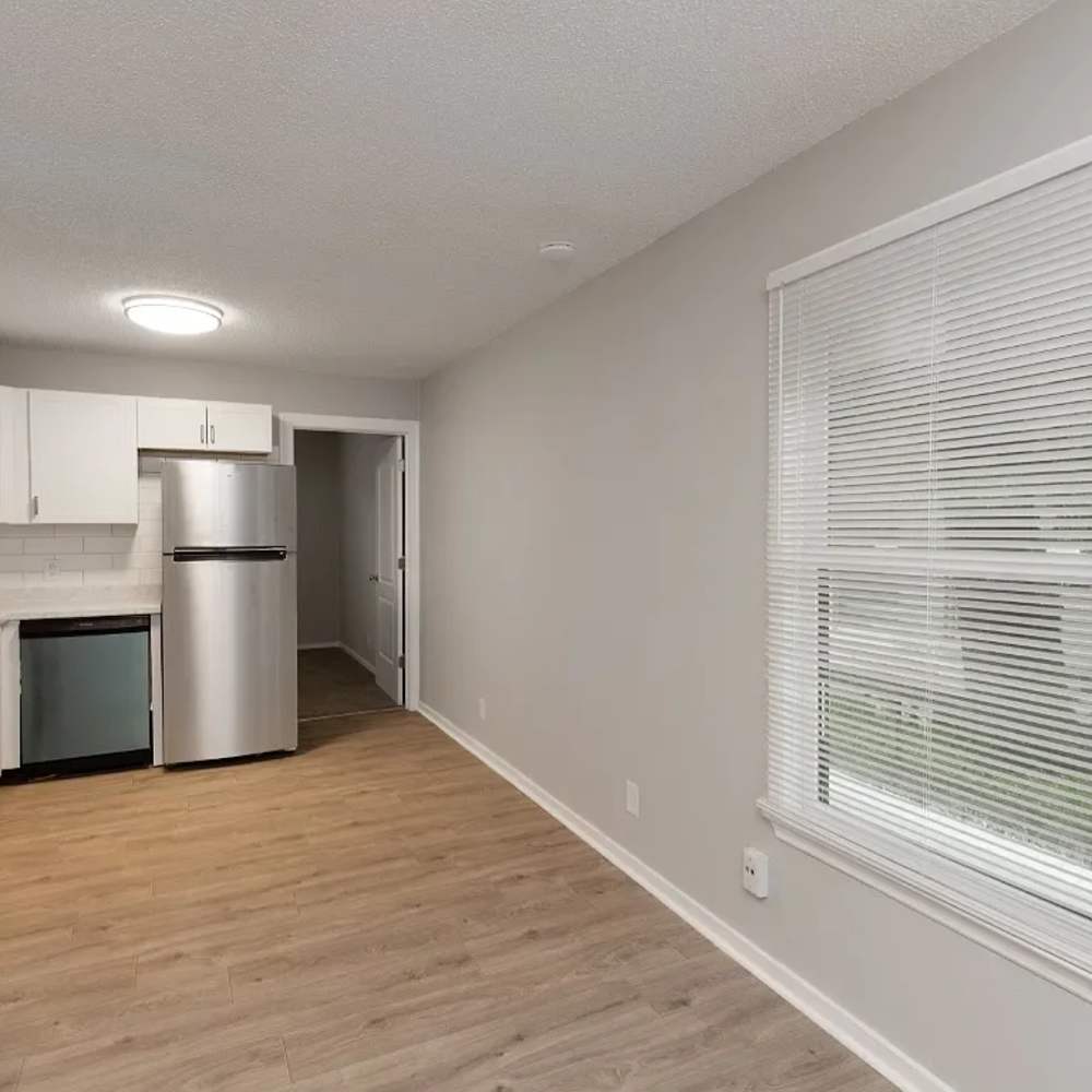 View of the kitchen with a refrigerator at 1104 18th Ave S in Nashville, Tennessee