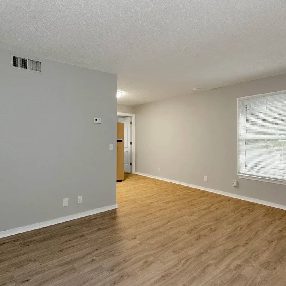 Living room with a large window at 1104 18th Ave S in Nashville, Tennessee