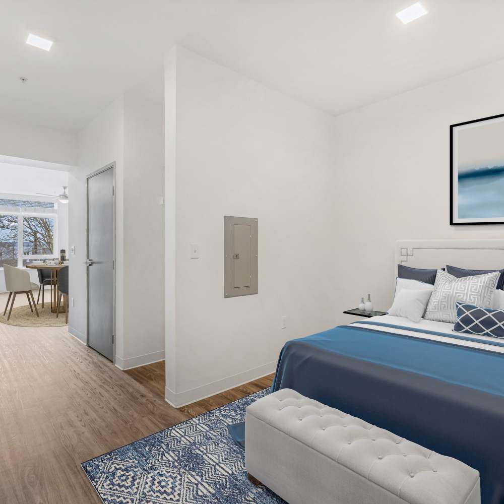 Modern bedroom with a blue and white color scheme at Koz on 13th in Portland, Oregon