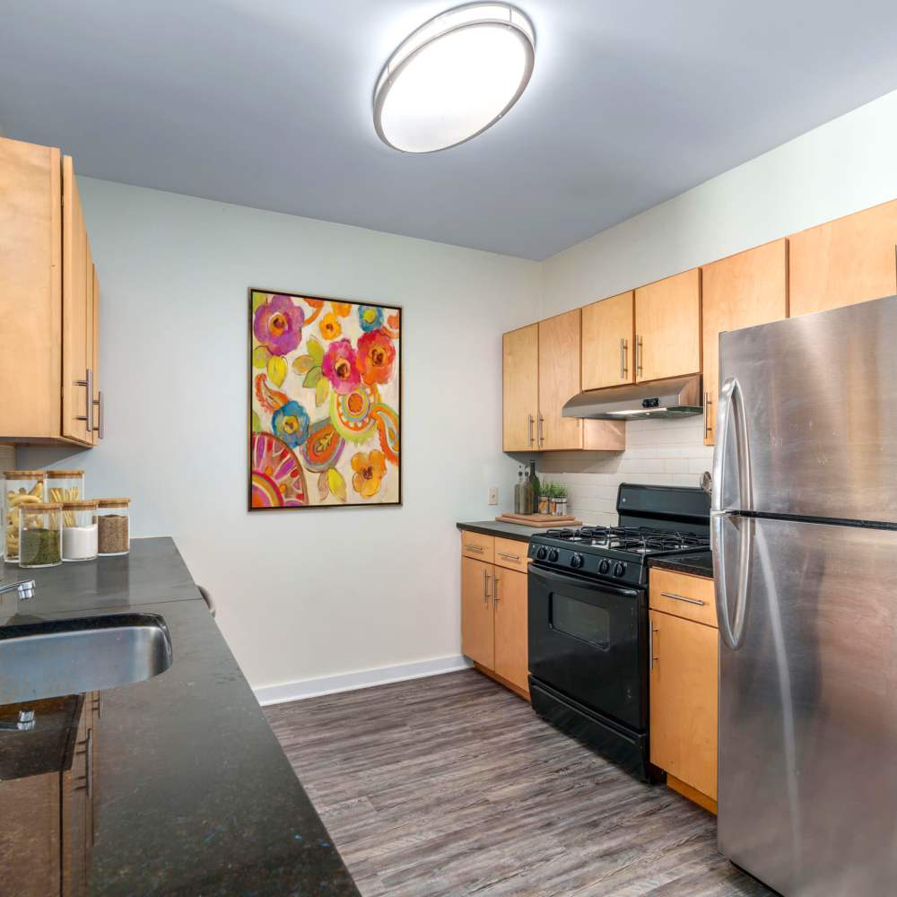 Open kitchen with stainless appliances at Paseo Verde in Philadelphia, Pennsylvania