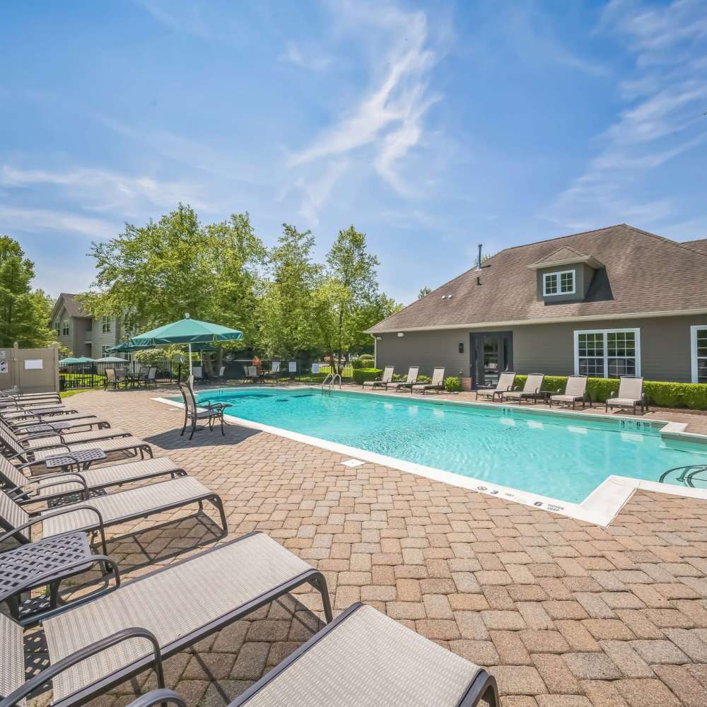 Apartment bedroom with spacious walk-in closet at Riverbend at Wappingers Falls in Wappingers Falls, New York