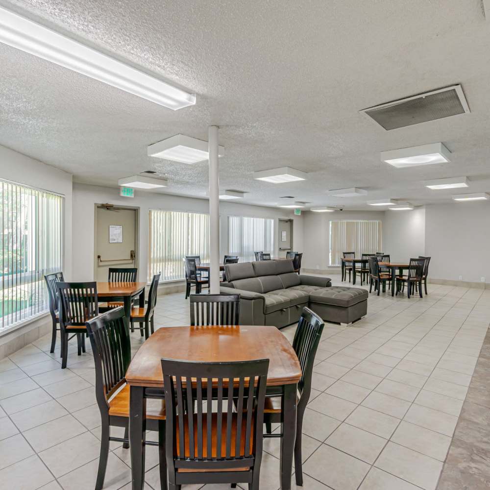 Recreation Room with chairs and tables at Clayton Gardens in Concord, California