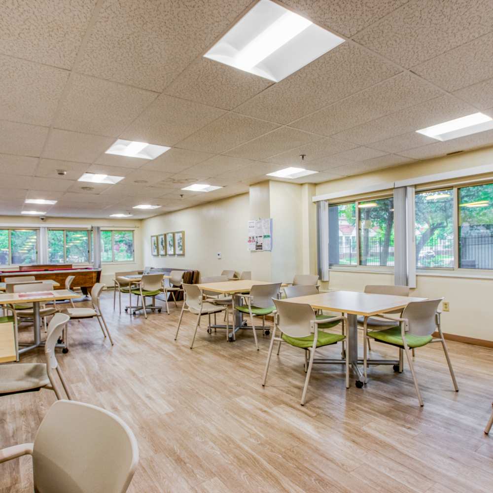 Club house with wood flooring at Village Center in Detroit, Michigan