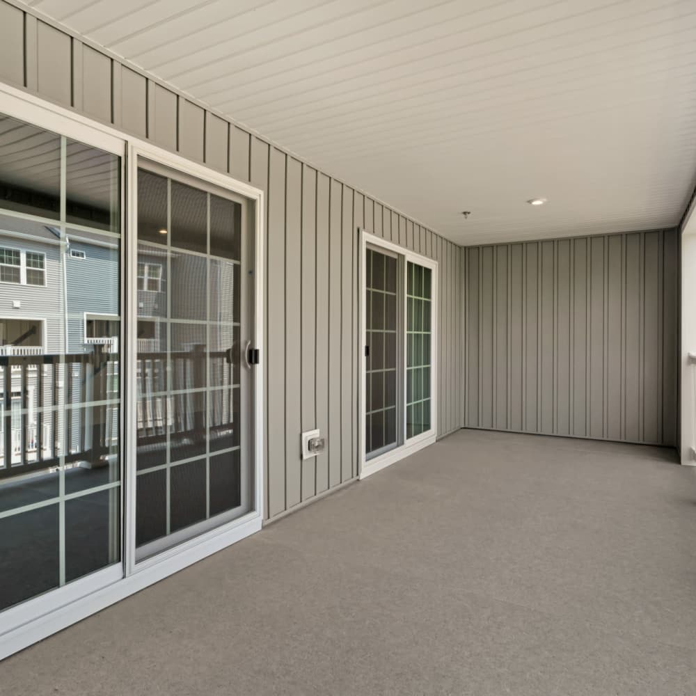 Balcony area showcasing the doors and windows to the apartment unit at Dorsey Overlook in Ellicott City, Maryland