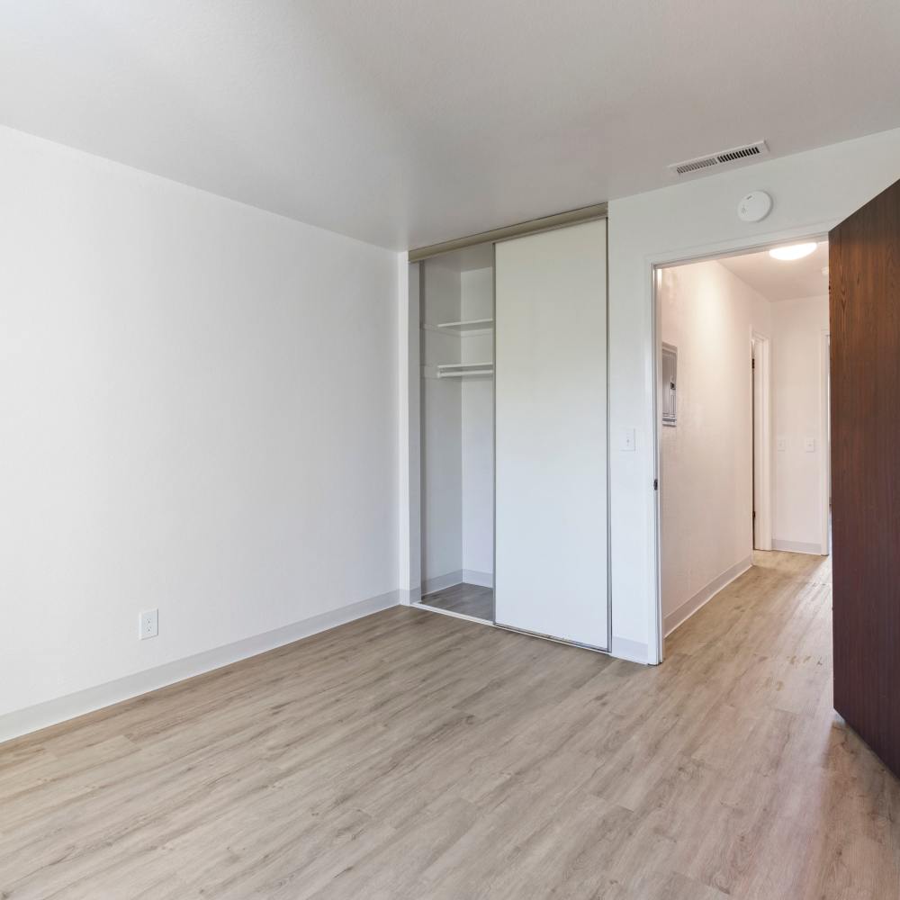 Bedroom with large closet at Mission Gardens in Santa Cruz, California
