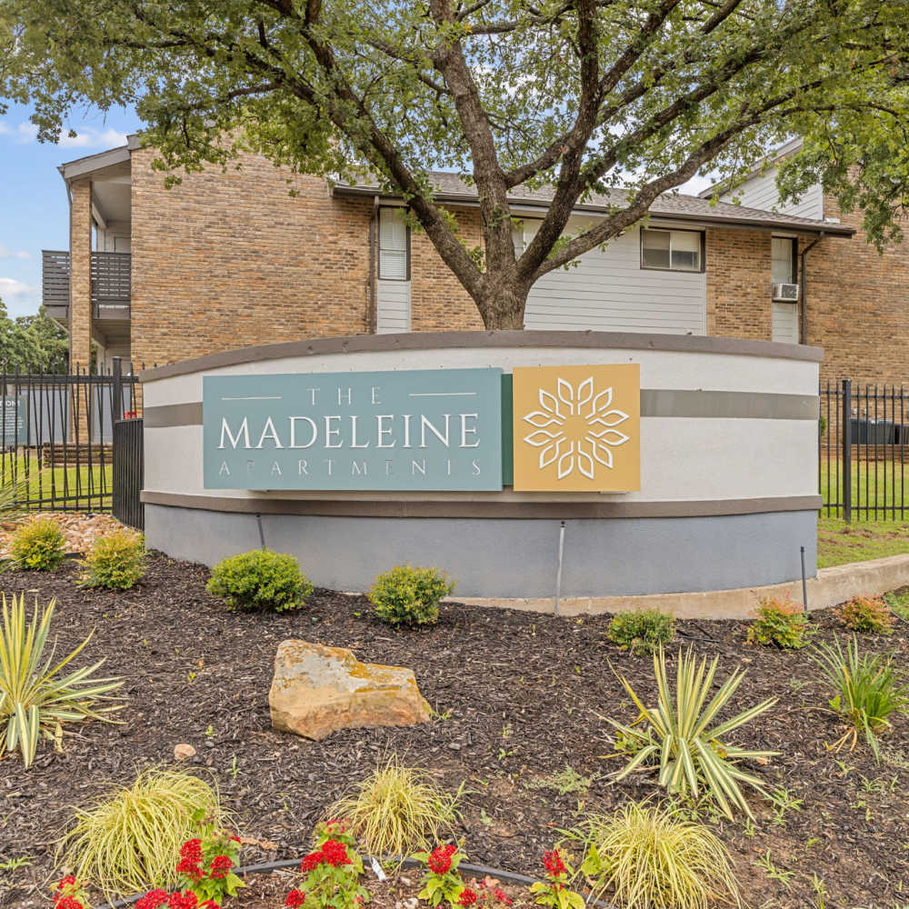 Outdoor signage at The Madeleine in Fort Worth, Texas