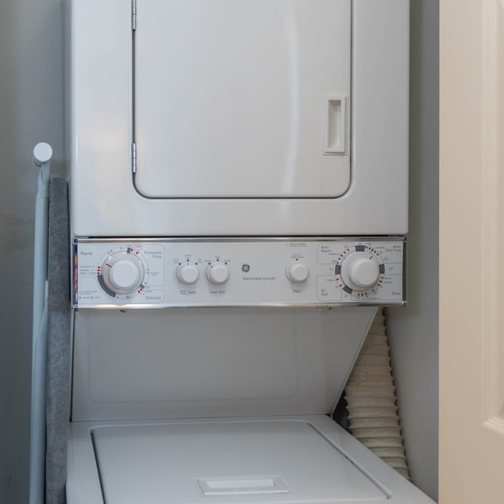 Stacked washer and dryer in an apartment at Reserve South in Richmond, Virginia