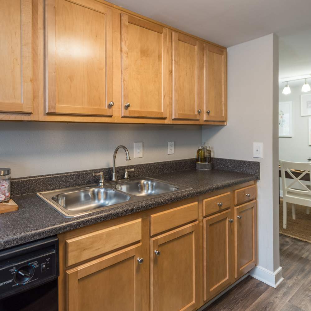 Wood-style flooring in an apartment kitchen at Reserve South in Richmond, Virginia