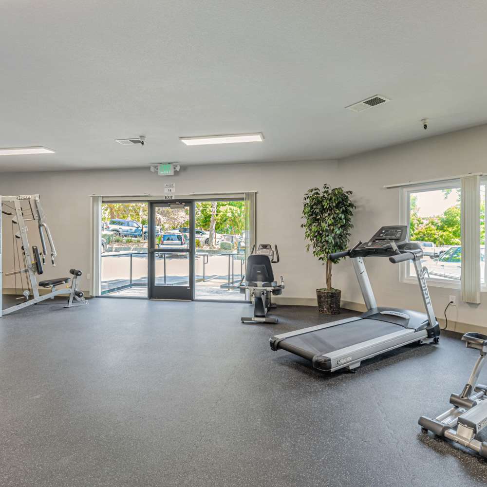 Fitness center with variety of equipment at Martinez Hillside in Martinez, California