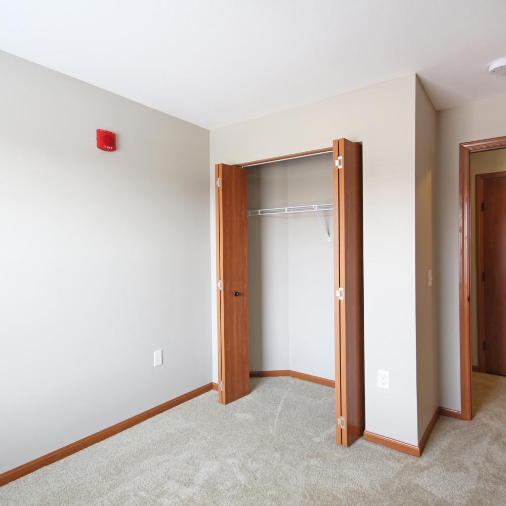Bedroom with closet at Parkview East in Ramsey, Minnesota