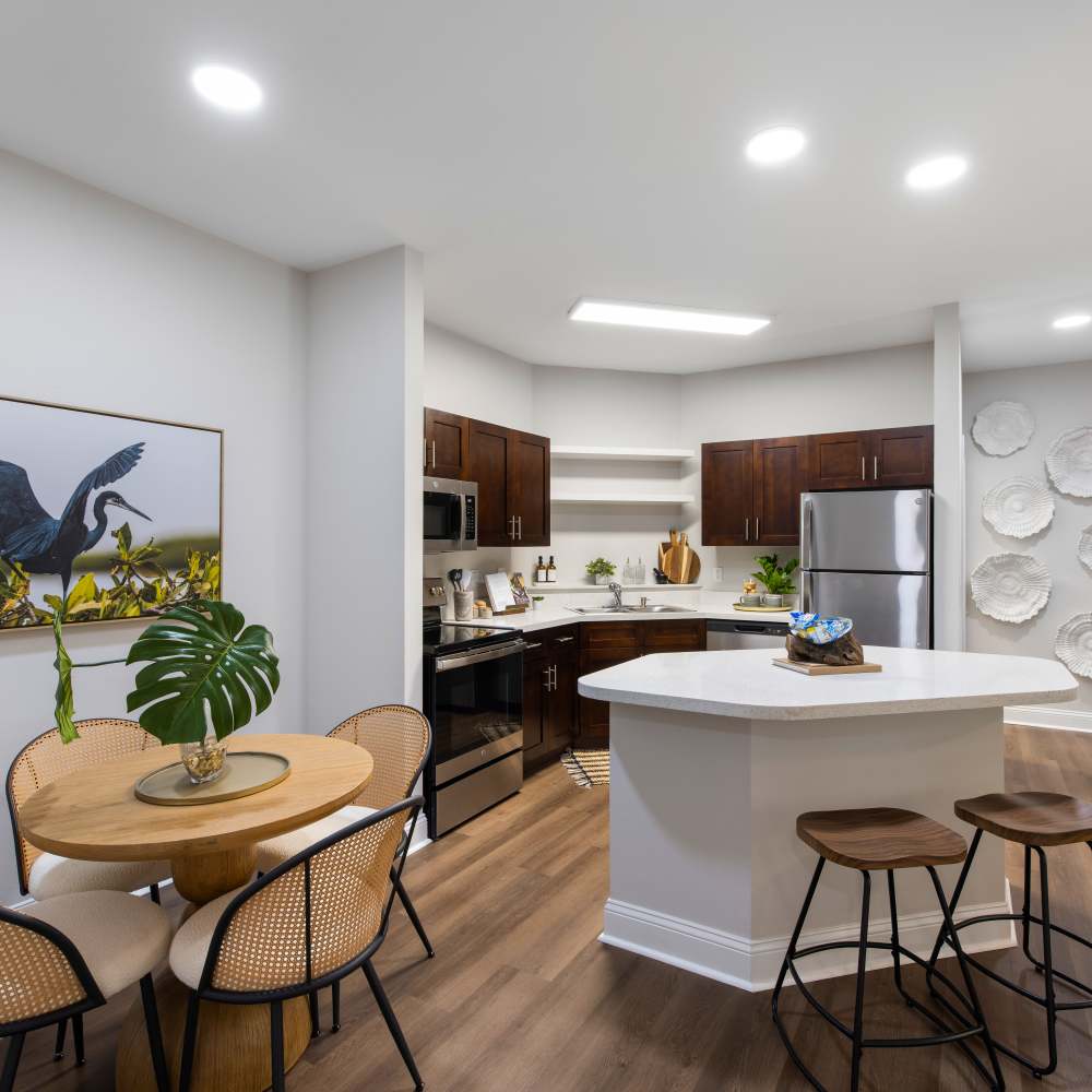 Kitchen with wood-flooring at The Apartments at Shade Tree in Johns Island, South Carolina