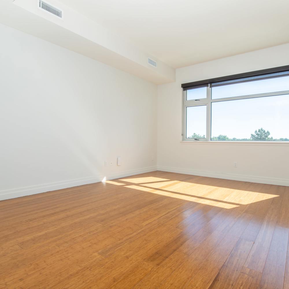 Bedroom with a large window at The View at Wash Park in Denver, Colorado