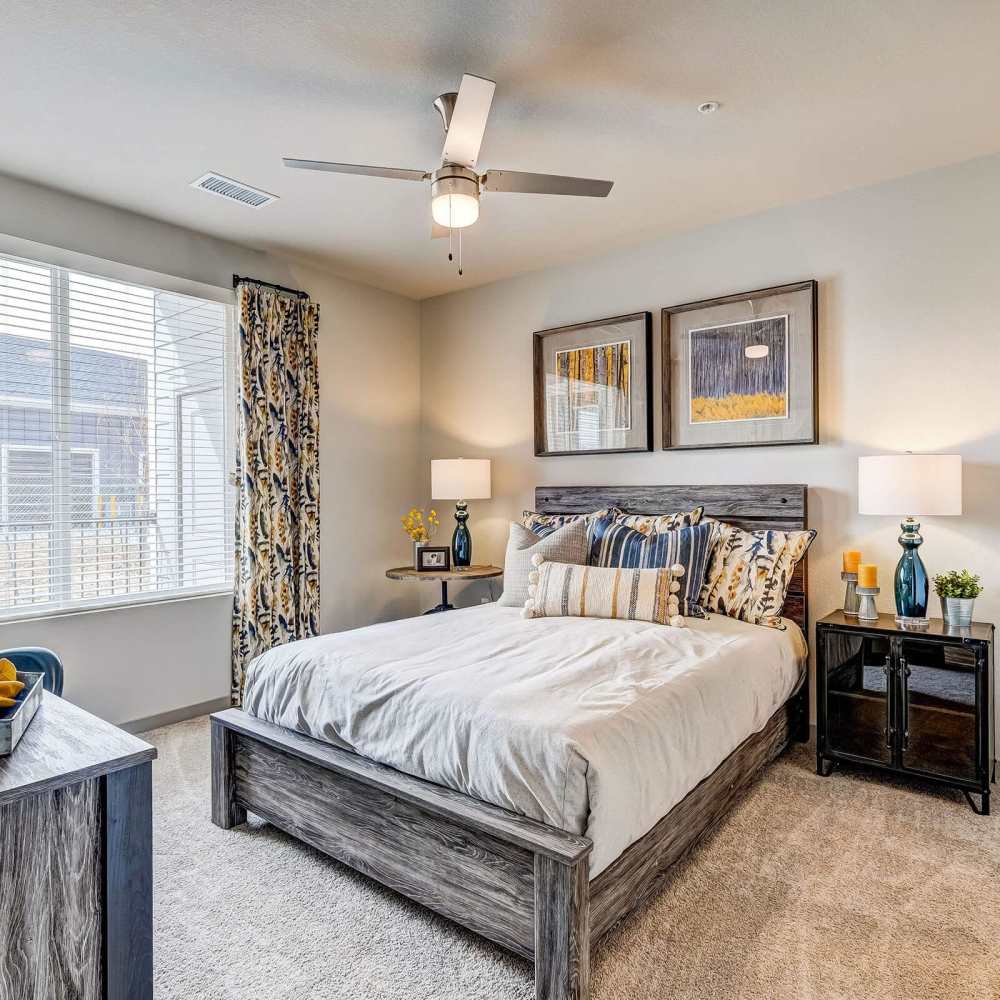 Spacious bedroom with a large window at Clear Creek Crossing in Wheat Ridge,Colorado