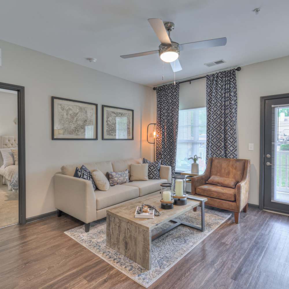 Living room with ceiling fan at Anthem at Creekside in Smyrna, Tennessee