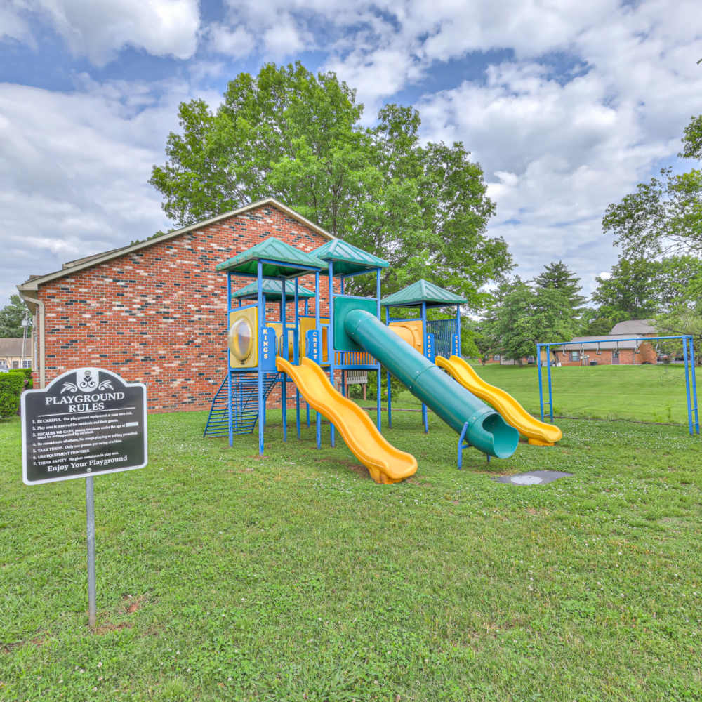 Play area with multiple slidesat King's Crest Townhomes in Smyrna, Tennessee