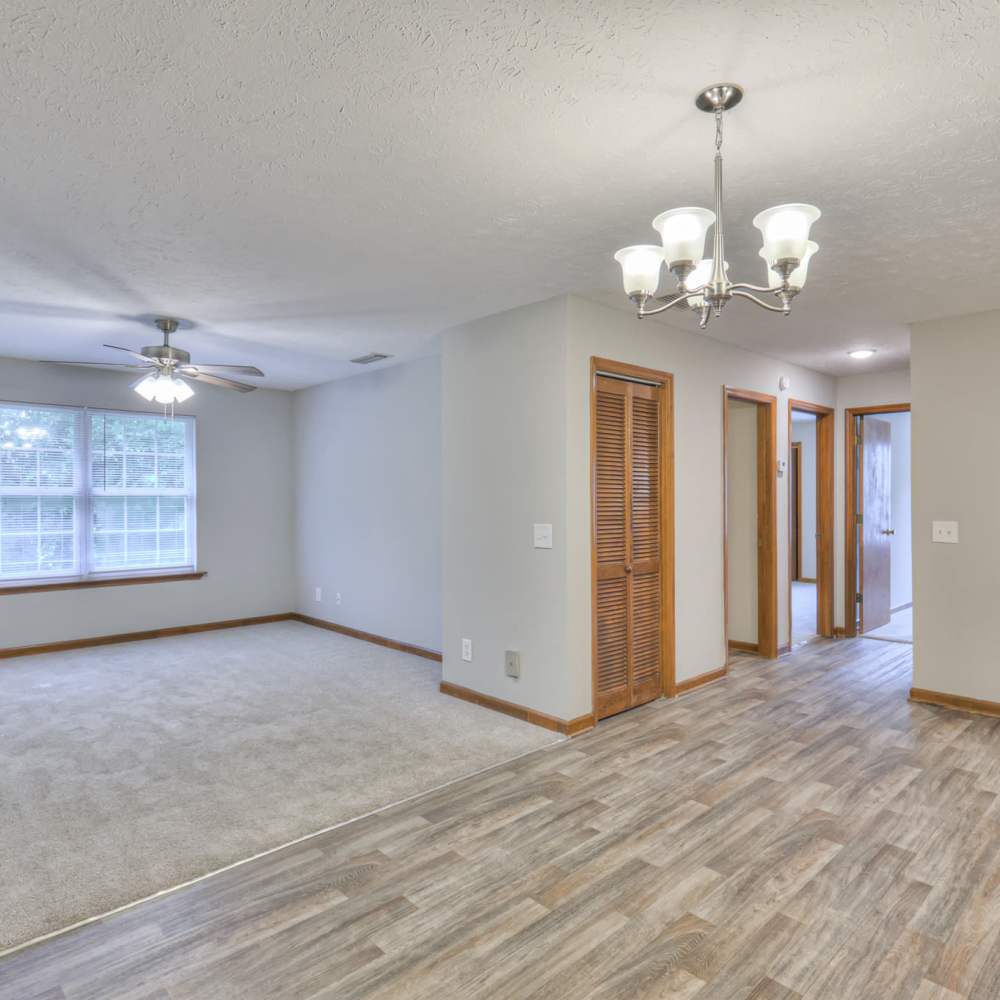 Unfurnished living room and access to bathroom at Laurel Woods Apartments in Smyrna,Tennessee