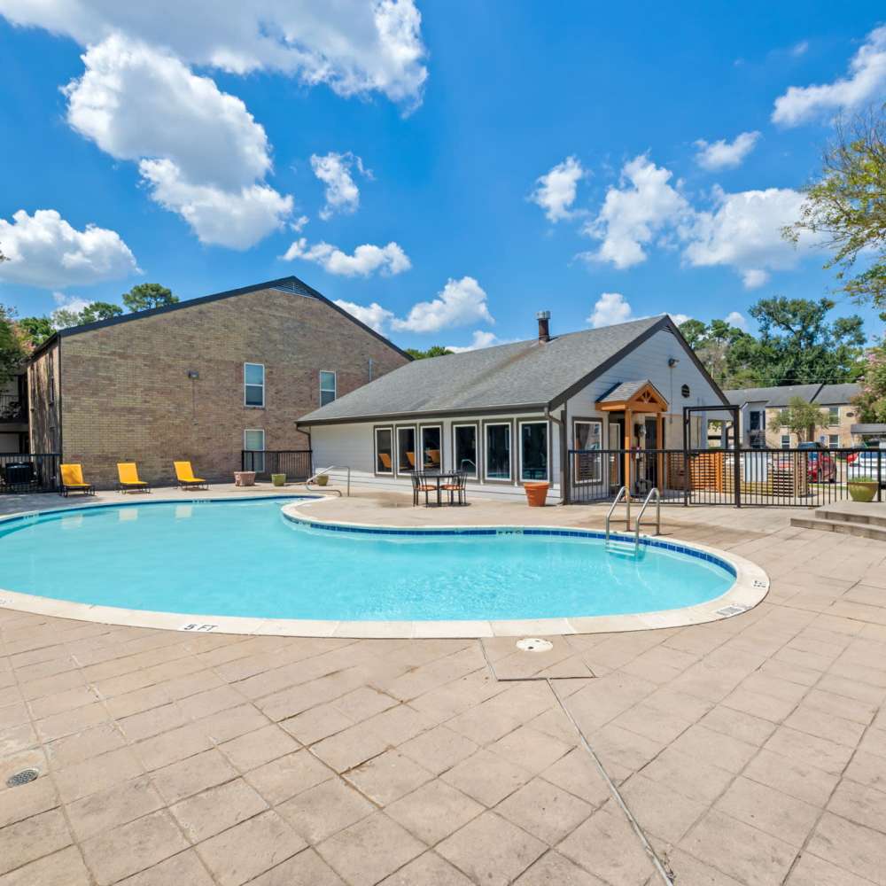 Wide shot of swimming pool at Mustang on the Trail in Kingwood, Texas