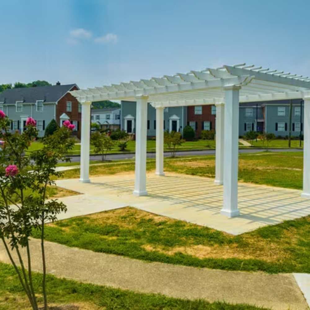 Outdoor community seating surrounded with greenery at Park Vue Place in Richmond, Virginia