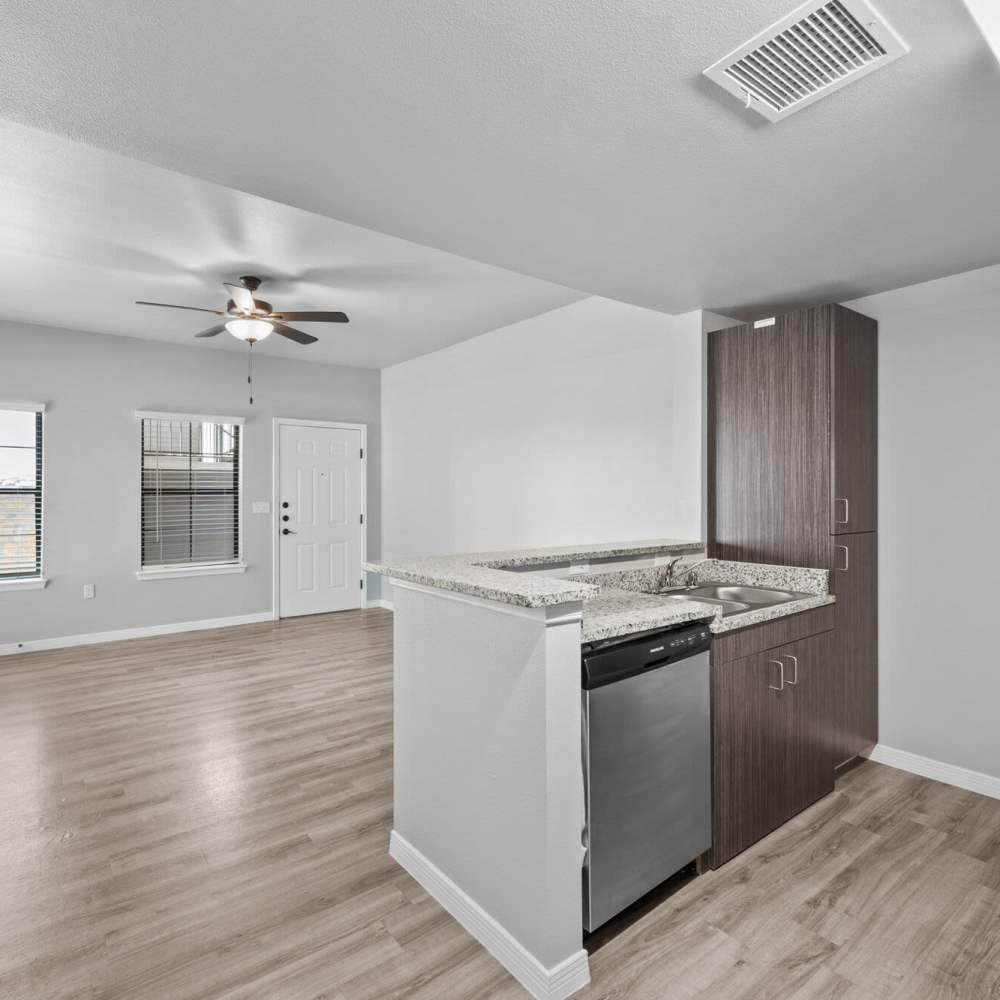 Kitchen with view with living room at District At Pellicano in El Paso, Texas
