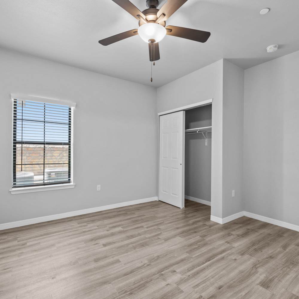 Bedroom with ceiling fan at District At Pellicano in El Paso, Texas