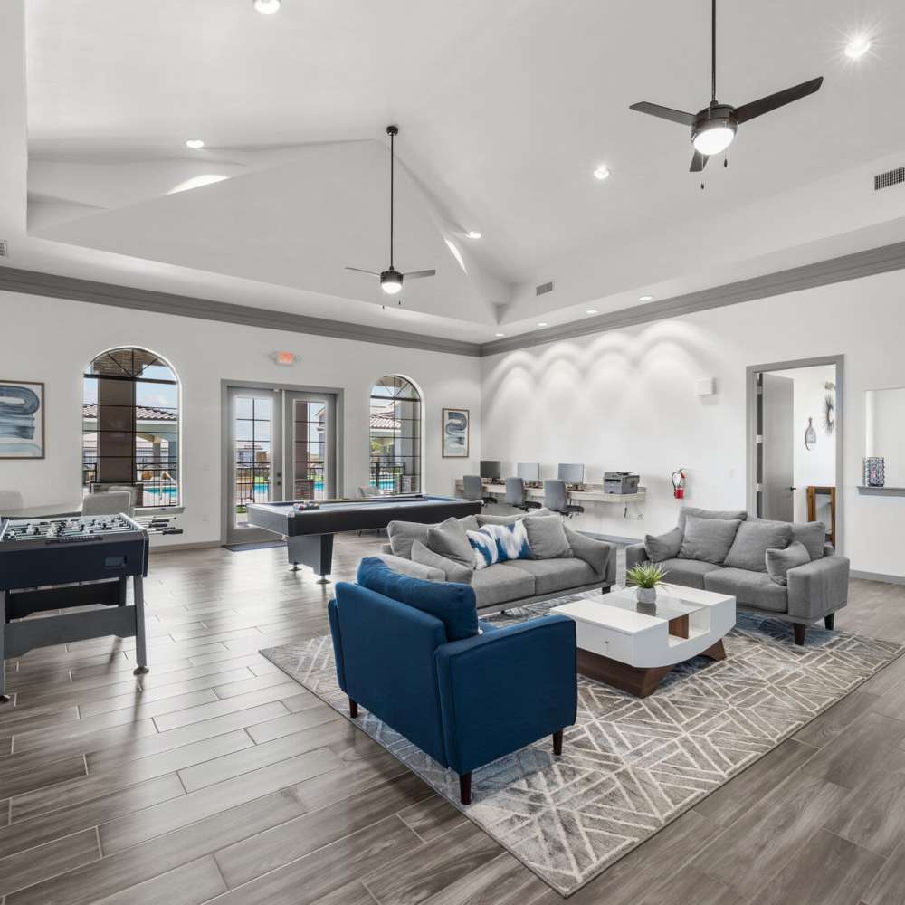 Clubhouse with lots of seating space at District At Pellicano in El Paso, Texas