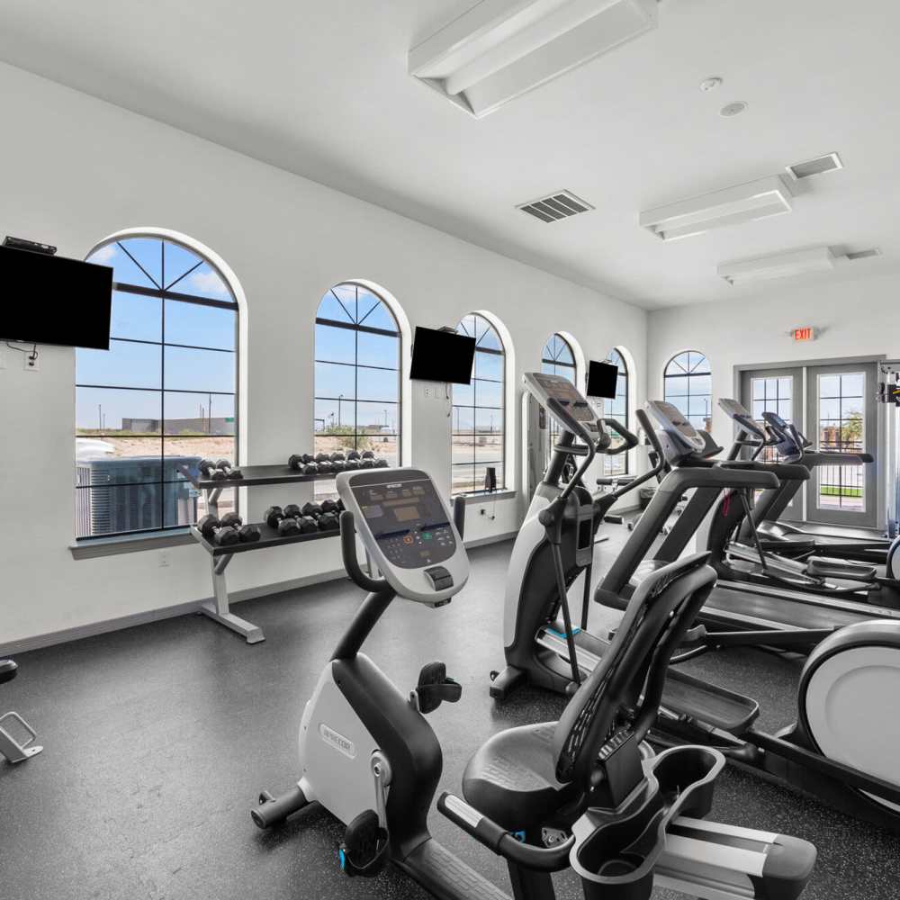 Fitness center with treadmills at District At Pellicano in El Paso, Texas