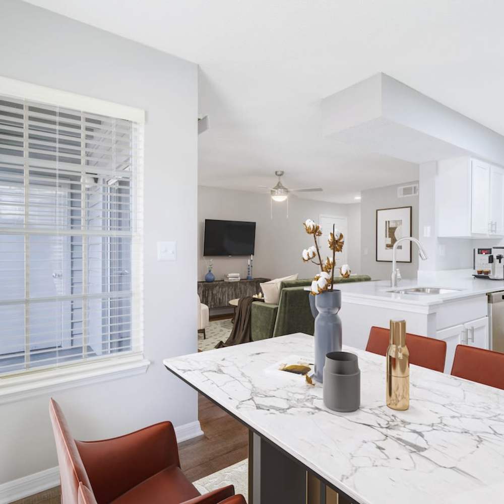 Dining room looking into living room with spacious layout