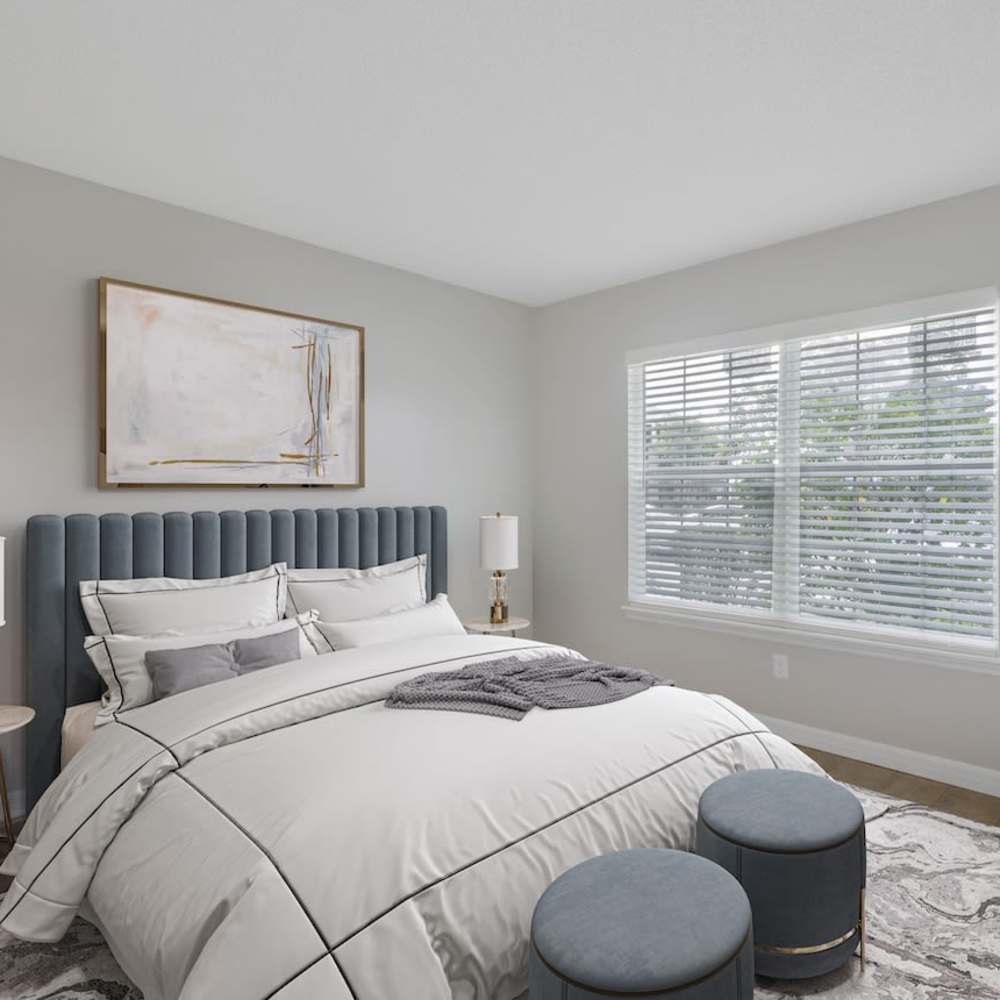 Bedroom with large windows with natural light