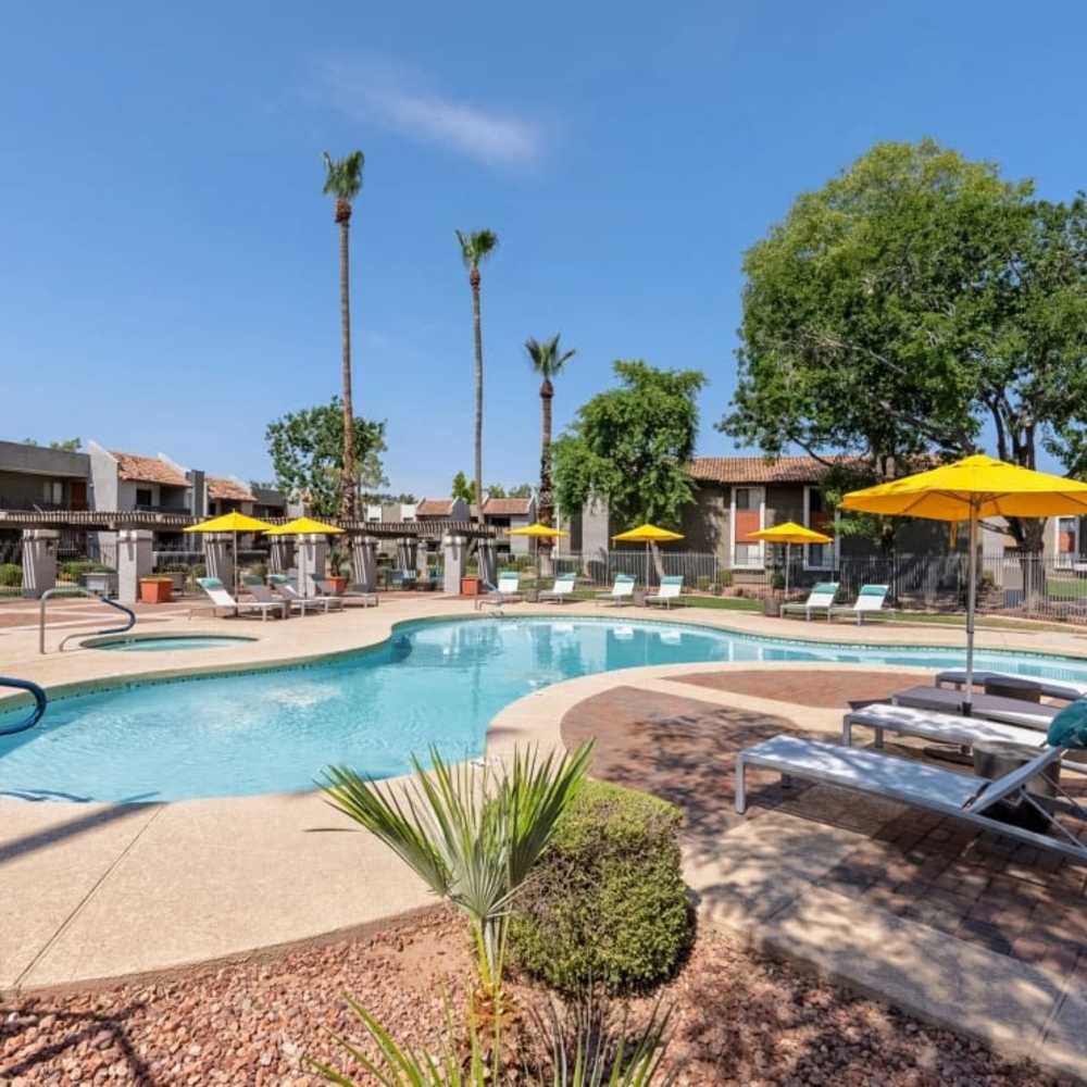 Pool with yellow canopies at Park Lane Commons in Chandler, Arizona
