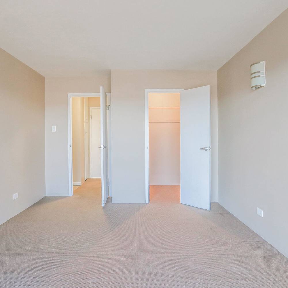 Bedroom with attached bathroom at Wellshire Apartments in Denver,Colorado