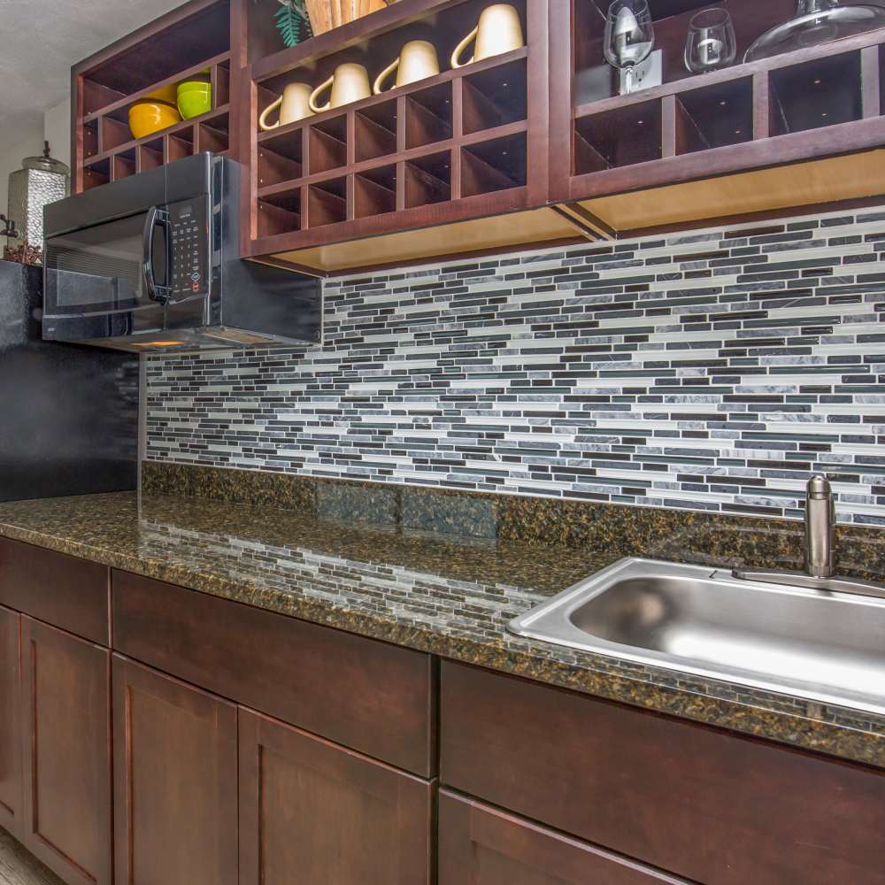Aesthetic kitchen inside the clubhouse at Wellshire Apartments in Denver,Colorado