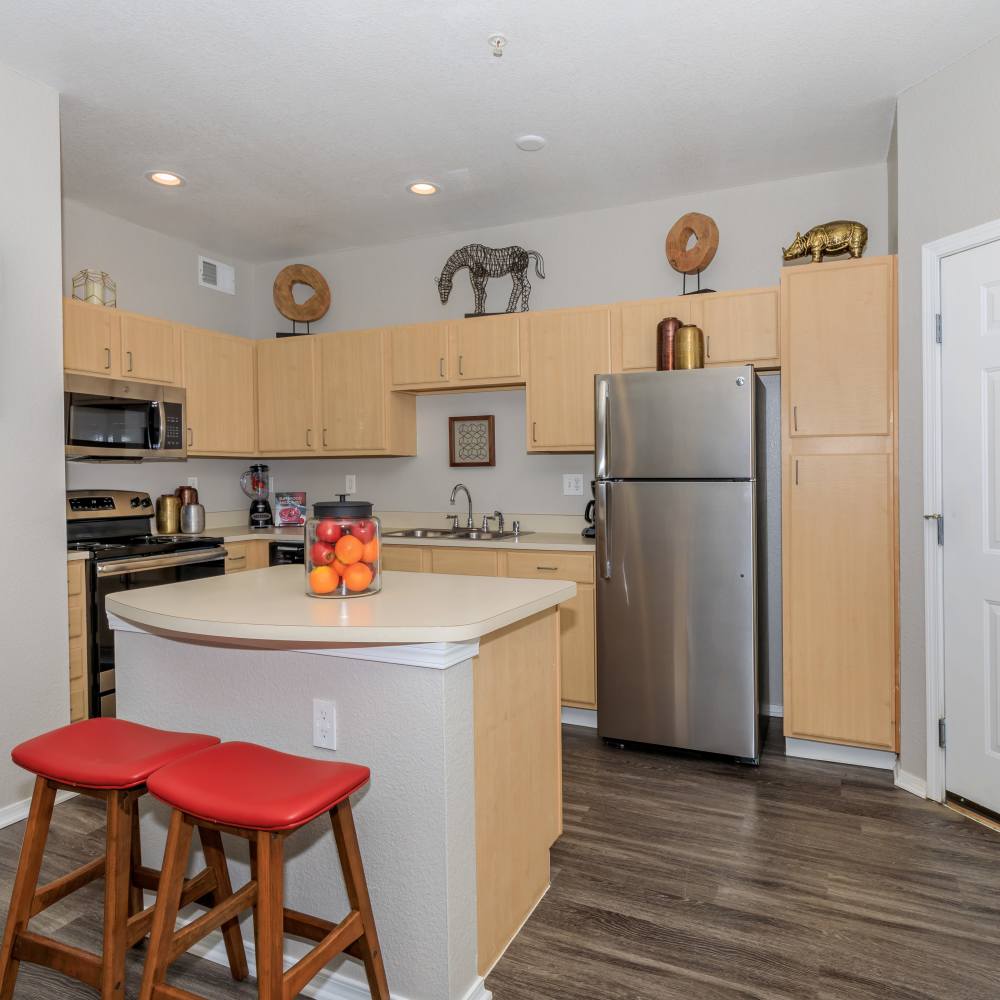 Island with stools at Panorama at Arvada Ridge in Arvada, Colorado