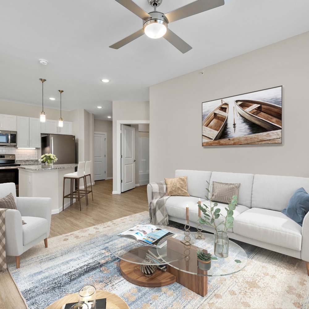 Modern living room with a comfortable couch and a coffee table at Citrine at Lake St. Louis in Lake Saint Louis, Missouri