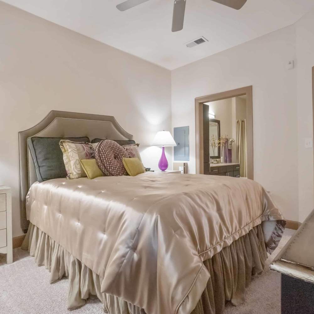 Bedroom with spacious bed at Grapevine Station in Grapevine,Texas