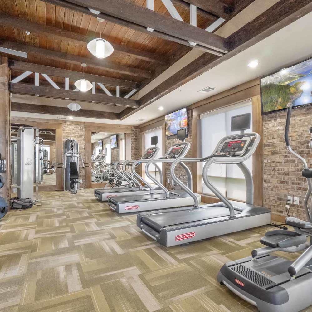 Community fitness center with multiple treadmills at Grapevine Station in Grapevine,Texas