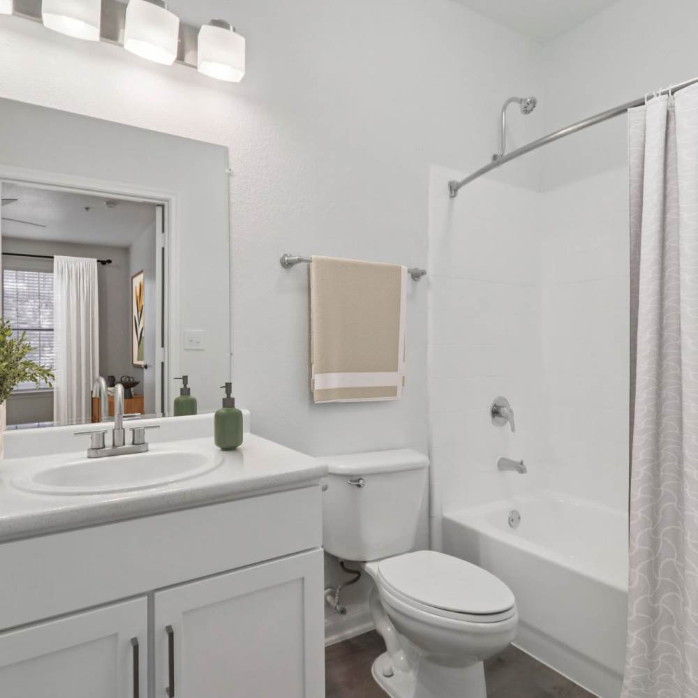 Bathroom with bathtub at Harlan at Med Center in San Antonio, Texas  