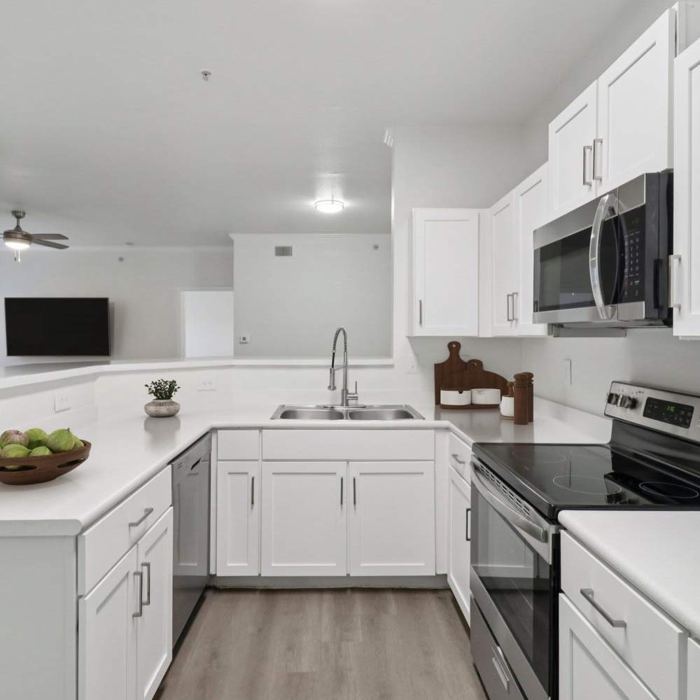 Kitchen with wooden flooring at Harlan at Med Center in San Antonio, Texas 