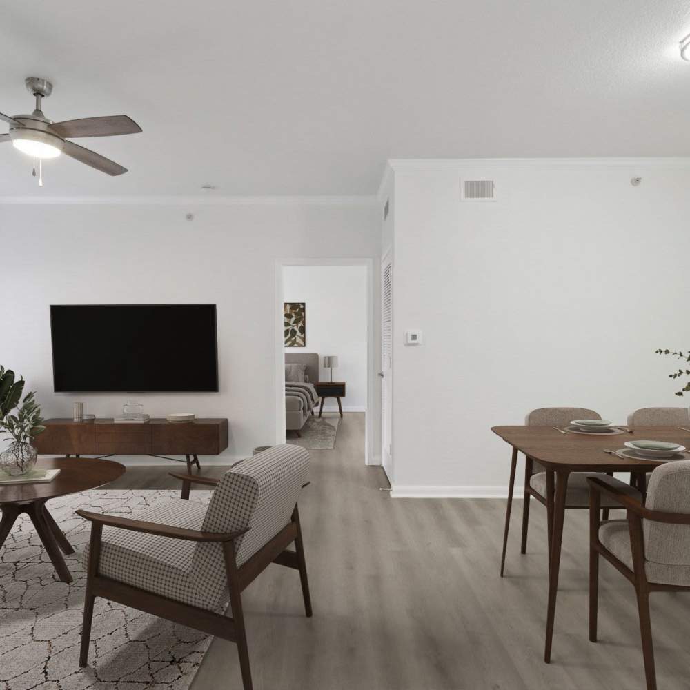Living room with television at Harlan at Med Center in San Antonio, Texas 