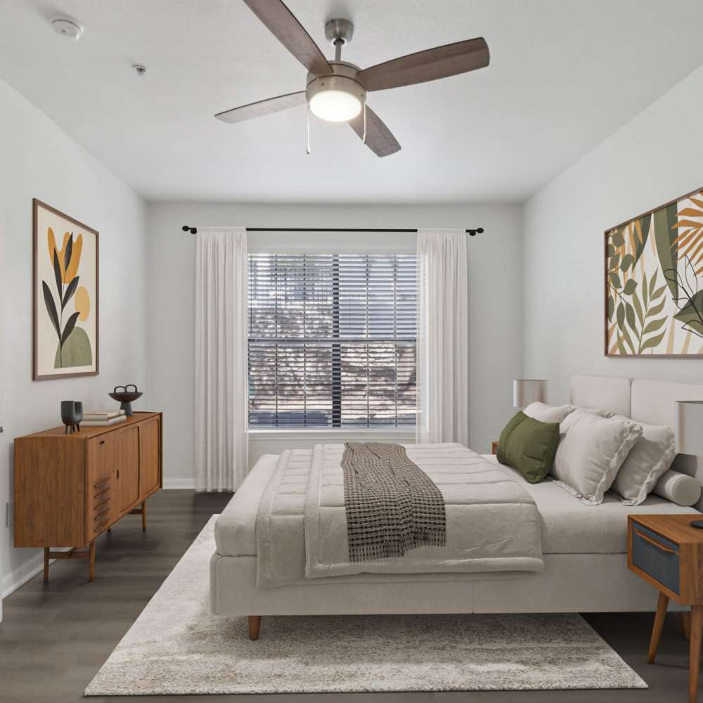 Bedroom with window for ample natural light at Harlan at Med Center in San Antonio, Texas 