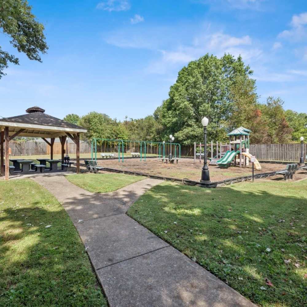 Wide pathway leading to the kids' playground at Davis Park in Smyrna, Tennessee