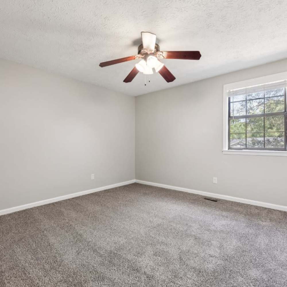 Unfurnished bedroom with ceiling fan at Davis Park in Smyrna, Tennessee