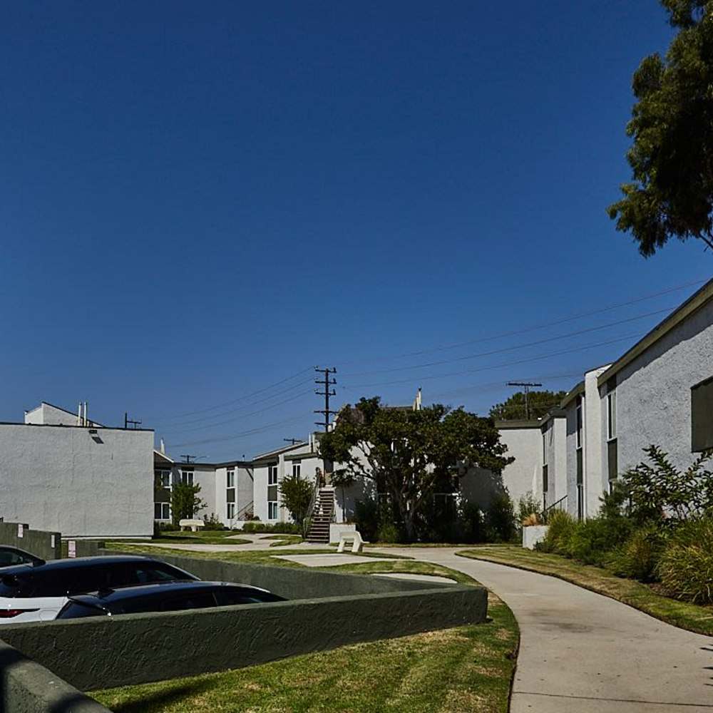 An apartment with parking spce at Parthenia Townhouses in Canoga Park,California