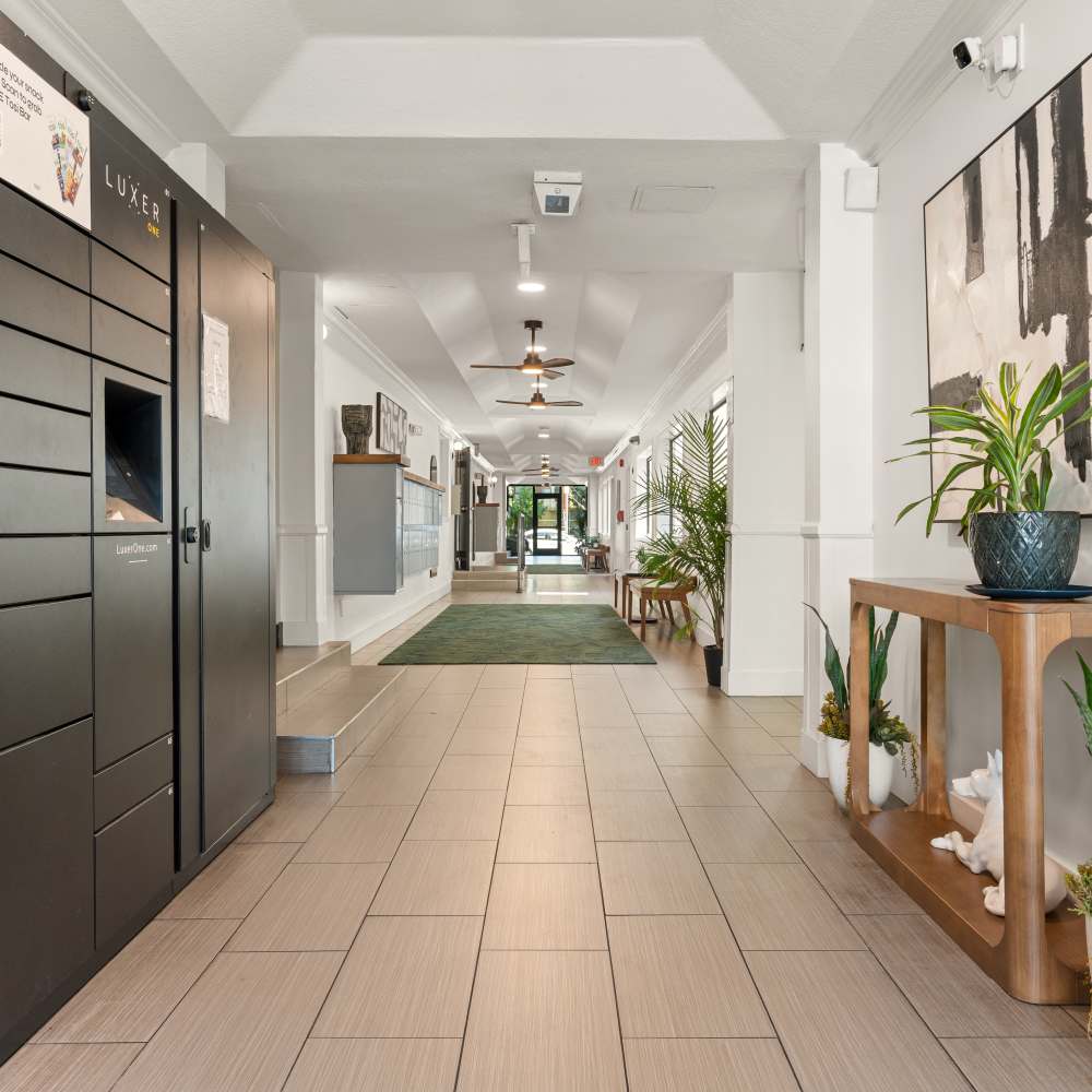 Hallway with package lockers on the left at Canyon Village in North Hollywood, California