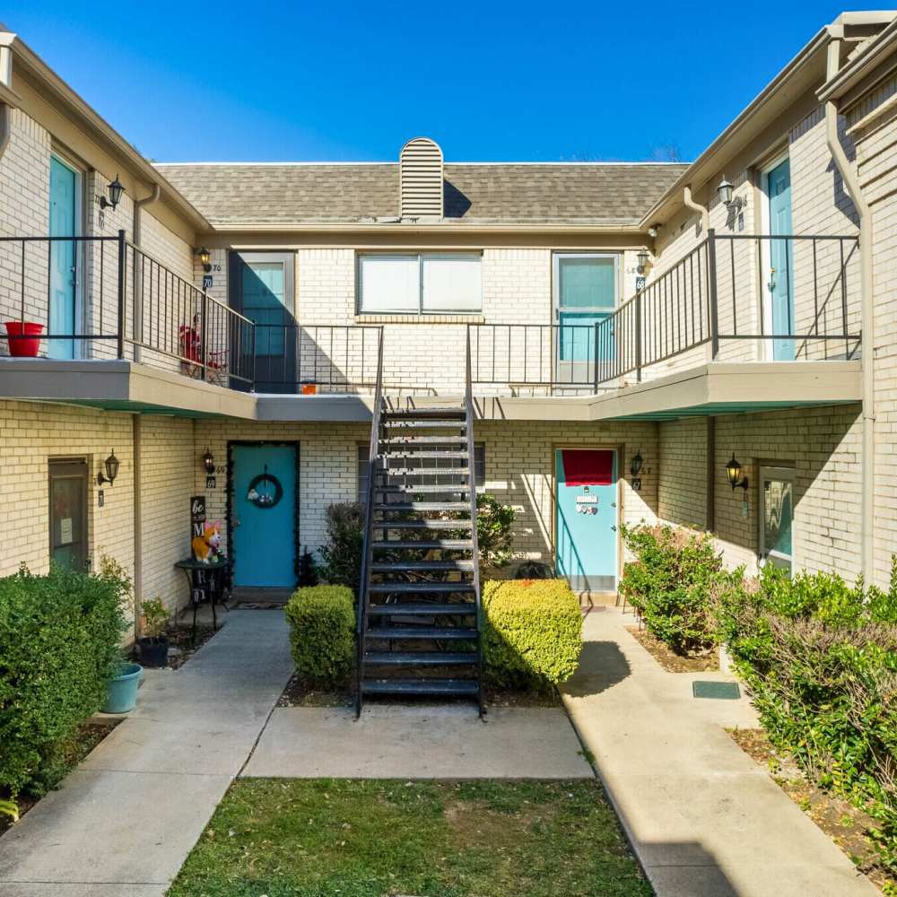 Stairs to the first floor at 32Ten on the Blvd in Richland Hills, Texas