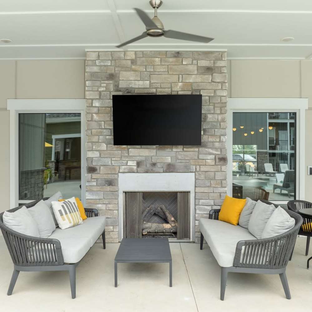 Clubhouse with a TV and chairs at Citrine at Lake St. Louis in Lake Saint Louis,Missouri